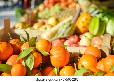 Closeup image of Chinese cabbage Bok Choy among exotic fruit and vegetables at farmers market. Retail business concept - Powered by Shutterstock