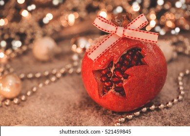 Close-up image of Christmas pomegranate with retro filter effect - Powered by Shutterstock