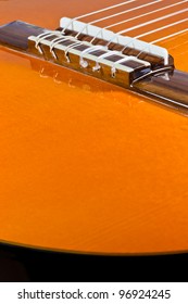 The closeup image of a classical guitar