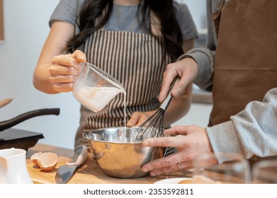 Premium Photo  Making a milkshake with an electric hand mixer refreshing  drink by the hands of the chef