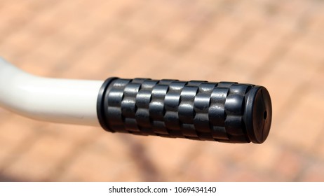 Close-up image of a exercise tool handle.