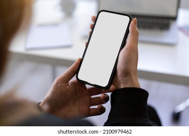 Close-up Image Of A Female Using Smartphone, Searching The Interested Content On The Internet, Scrolling On A Social Media. Phone Blank Screen Mockup