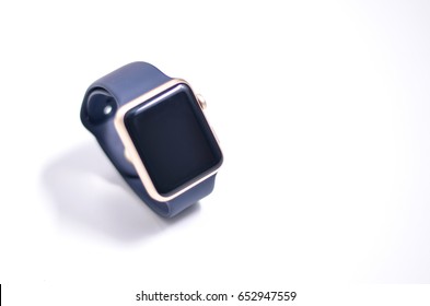 Close-up Image Of Gold Smart-watch With Black Screen. Wearable Technology, Technology And Commercial. White Plain Background. Isolated, Soft Focus.