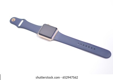 Close-up Image Of Gold Smart-watch With Black Screen. Wearable Technology, Technology And Commercial. White Plain Background. Isolated, Soft Focus.