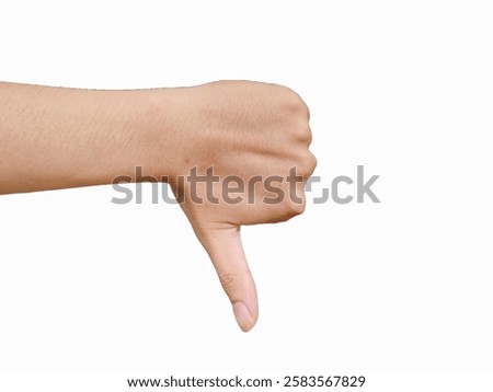 A close-up image of a hand displaying a thumbs-down gesture against a plain white background, signifying disapproval, dislike, or disagreement.