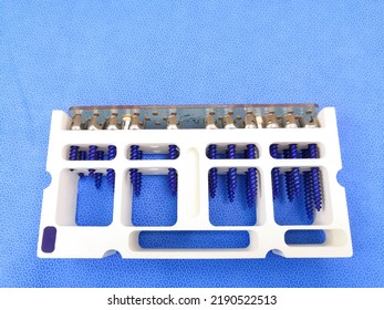 Closeup Image Of Implant Spinal Pedicle Screws In The Container