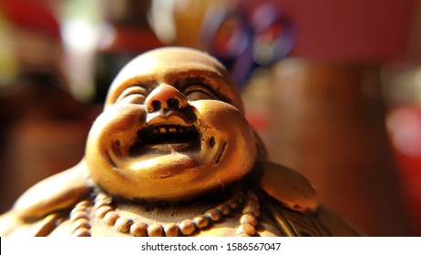 closeup image of laughing buddha