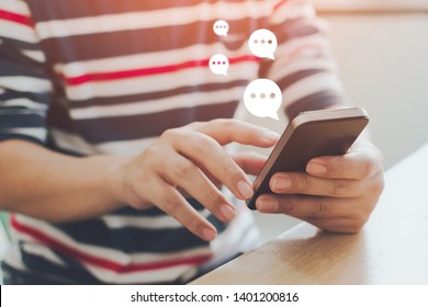 Close-up image of male hands typing text on mobile smartphone. Online live chat chatting on application communication digital media website and social network - Shutterstock ID 1401200816