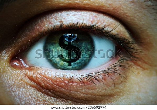 Closeup\
image of a man with a dollar symbol in his\
eye