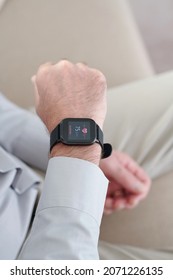 Closeup Image Of Mature Man Checking Heart Rate Via Application On Smart Watch