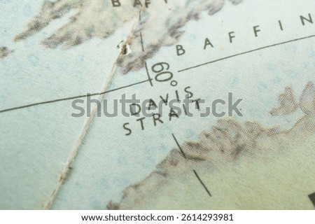 Close-up image of a nautical chart featuring Bainbridge and Davis Straits Likely references to geographic locations, possibly coastal areas with bays or indentations Dashed line indicates navig