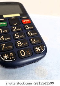 A close-up image of an old model mobile phone.