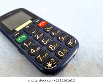 A close-up image of an old model mobile phone.