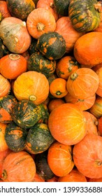 Closeup image of orange pumpking in begetable soter.Closeup texture or pattern of fresh ripe vegetables. Beautiful food background