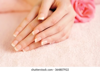 Closeup image of pink french manicure