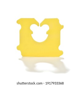 Close-up Image Of A Plastic Bread Bag Clip To Hold Plastic Bags Closed For Sliced Bread Isolated On White Background.  