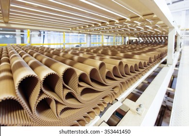 Closeup image of pleat cardboard row at factory background.