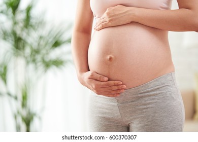 Close-up image of pregnant woman belly