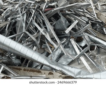 Close-up image of scrap metal and industrial waste, ideal for themes related to recycling, circular economy, and sustainability. Perfect for highlighting environmental impact and waste management. - Powered by Shutterstock