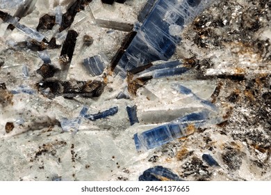 A close-up image showcasing the background texture of Kyanite, a typically blue aluminosilicate mineral known for its blade-like crystal structure, often used in ceramics and jewelry