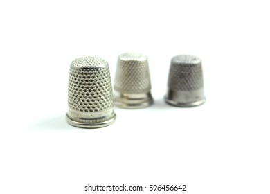 A close-up image of a thimble. 