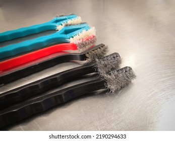 Closeup Image Of Used And Damaged Surgical Instrument Cleaning Wire And Nylon Brushes