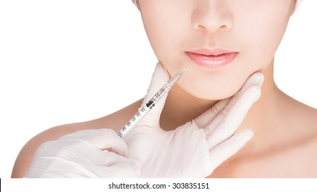 closeup image of a woman. injection in lips. isolated on white with clipping path