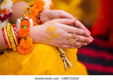 Closeup Of Indian Woman Hands Wearing Golden Ring Praying And Celebrating Doing Namaste, Girl Prayer Hands Folded, Indian Wedding Haldi Ceremony , Coronavirus, Covid-19, Namaste Concept