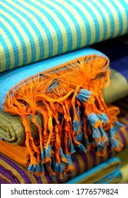  Close-up Of Indian Woman Traditional Dress Saree Or Sari Stacked In Display In A Retail Store                              