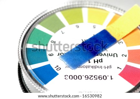 close-up of a indicator paper with alkaline testing