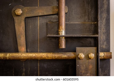 Closeup Of Industrial Looking Inner Workings Of An Old Bank Safe Interior Door