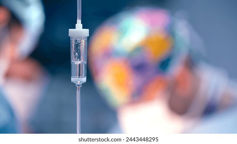 Close-up of the infusion process. A drop of saline is dropped for intravenous infusion. - Powered by Shutterstock