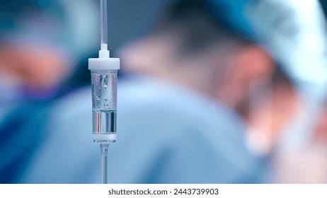 Close-up of the infusion process. A drop of saline is dropped for intravenous infusion. - Powered by Shutterstock