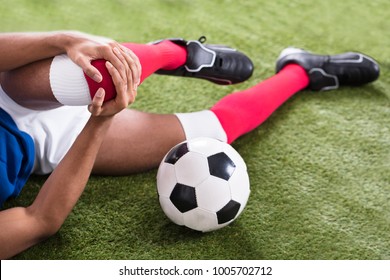 Close-up Of An Injured Male Soccer Player On Field - Powered by Shutterstock