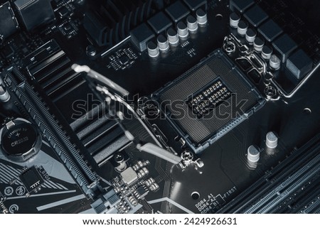 Closeup of an Intel LGA1700 CPU socket on an Gigabite B660M D3SH motherboard without CPU installed without logos