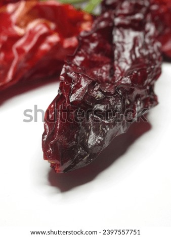 Close-up of intensely dried spicy pepper, adding a bold and flavorful touch to your culinary-themed visuals