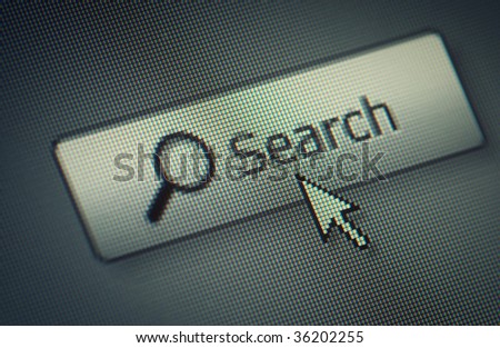 Close-up of a interface computer search button and an arrow mouse cursor