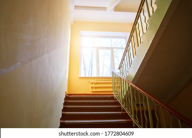 Close-up of the internal staircase in the old school. Empty stairs