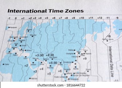 Closeup International Time Zone On White Paper Map.