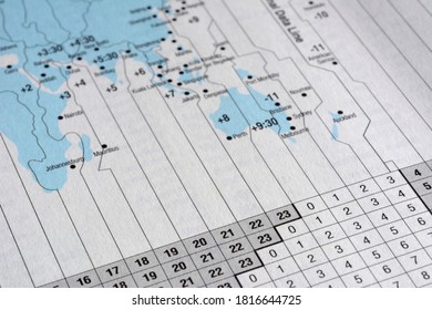 Closeup International Time Zone On White Paper Map.