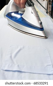 pressing a dress shirt