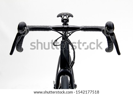 Closeup isolated of a black roadbike in front view 