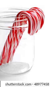 Closeup Of Isolated Candy Canes In A Jar