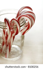 Closeup Of Isolated Candy Canes In A Jar