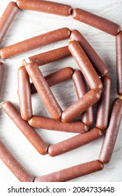 Closeup Isolated Image Of Strings Of Homemade Sucuk Or Sausage Stuffed In Casing And Made Into Strings Before Drying. Processed Red Meat Consumption Concept.