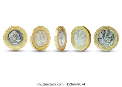 Closeup Of Isolated Of One Pound Sterling Coins Standing On White Background.