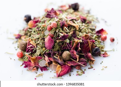 Close-up Of Italian Spices Blend With Rose On White Background. View From Above.