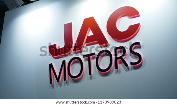 Close-up JAC motors logo in mims 2018 exposition.\
JAC motors is the famous automobile factory from China. SEP 03,\
2018 MOSCOW, RUSSIA