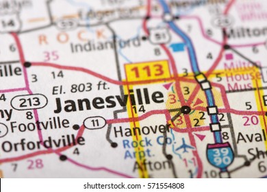 Closeup Of Janesville, Wisconsin On A Road Map Of The United States.