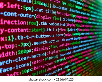 Closeup of Java Script and HTML code. SEO concepts for better SERP. Lots of digits on the computer screen. HTML CSS3 source code on lcd screen with black background.  - Shutterstock ID 2156674125